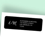 Monogrammed black and white wedding return address<br><div class="desc">Monogram wedding return address label with simple black and white handwriting script with a modern elegant look. Ideal for trendy simple contemporary spring summer autumn fall or winter weddings.</div>
