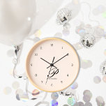 Monogrammed Blush Pink Wall Clock<br><div class="desc">Step into sophistication with our Personalised Script Wall Clock in captivating Blush Pink. The delicate script font, featuring your first initial and full name, adds a touch of personalised charm to your living space. Crafted with high-quality materials, this wall clock is built to stand the test of time. The Blush...</div>