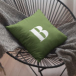 Monogrammed Dark Olive Green Cushion<br><div class="desc">Retro decorative monogram font style in white against a modern dark olive green.
Simple decor for your living room.
You can customise the background colour as well as the font style and colour.</div>