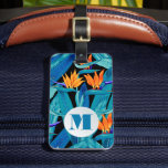 Monogrammed Floral Pattern Luggage Tag<br><div class="desc">A stylish luggage tag features a pattern of tropical bird of paradise flowers and your chic initial monogram on the front and your address information printed on the back OR choose the style you can insert your business card on the back. Create for yourself or give as a gift. MATCHING...</div>