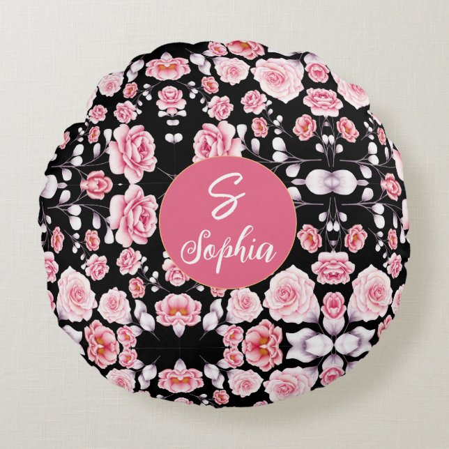 Monogrammed pink floral pattern on black round cushion (Front)