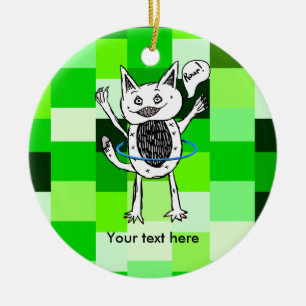 Monster having fun playing with a hoop ceramic tree decoration