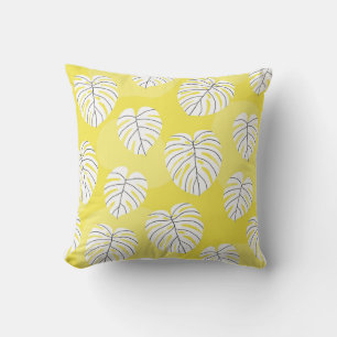 Monstera leaves, bright yellow background. cushion