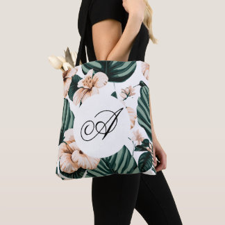 Monstera leaves hibiscus tote bag