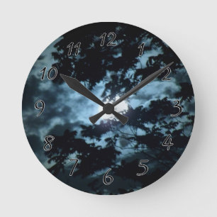 Moon Illuminates the Night behind Tree Branches Round Clock