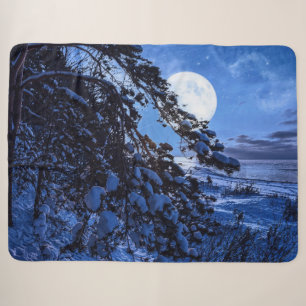 Moon over snowy fir tree and sea coast at night sherpa blanket