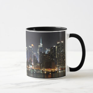 Moon rises over midtown New York. Mug