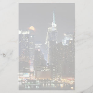 Moon rises over midtown New York. Stationery