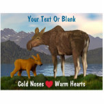 Moose In The Meadow Photo Sculpture Magnet<br><div class="desc">A common springtime sight in the North.  A mama moose and her cute calf with a lake and mountains in the distance.  The slogan "Cold Noses (A red heart) Warm Hearts" also appears. Add your own additional text.</div>
