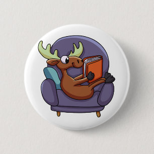 Moose reading a book on a sofa   choose back colou 6 cm round badge