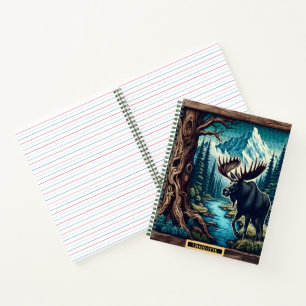 Moose strolls by a calm mountain stream notebook