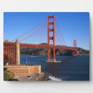 Morning light bathes the Golden Gate Bridge Plaque