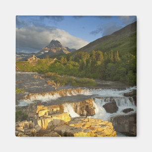 Morning light greets Swiftcurrent Falls in the Magnet