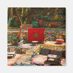Moroccan flag and colorful outdoor cafe, travel magnet