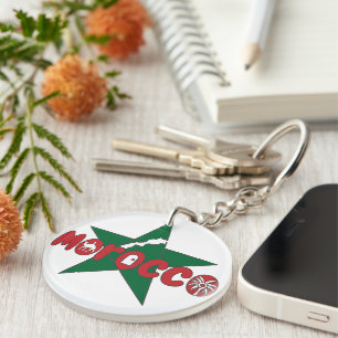Morocco is a wordmark of doors, dunes, and palms key ring