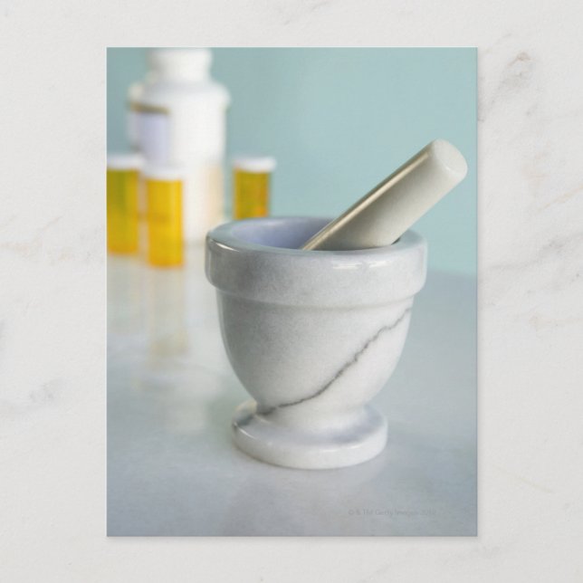Mortar and pestle, pill bottles in background postcard (Front)