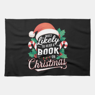 Most Likely To Read A Book On Christmas Tea Towel