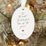 Most Wonderful Time Of The Year Christmas Script Ornament<br><div class="desc">it's the most Wonderful time of the year! Elegant,  scripted Christmas quote,  holiday ornament. Features,  black typography on soft beige background and festive red bow detail.</div>
