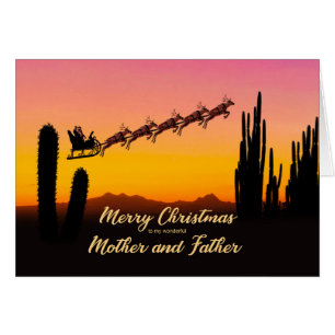 Mother and Father Christmas Santa Over Desert