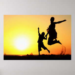 Mother and son silhouettes jumping on beach at sun poster