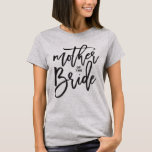 Mother of The Bride Brush Script Wedding T-shirt<br><div class="desc">Designed by fat*fa*tin. Easy to customise with your own text,  photo or image. For custom requests,  please contact fat*fa*tin directly. Custom charges apply.

www.zazzle.com/fat_fa_tin
www.zazzle.com/color_therapy
www.zazzle.com/fatfatin_blue_knot
www.zazzle.com/fatfatin_red_knot
www.zazzle.com/fatfatin_mini_me
www.zazzle.com/fatfatin_box
www.zazzle.com/fatfatin_design
www.zazzle.com/fatfatin_ink</div>