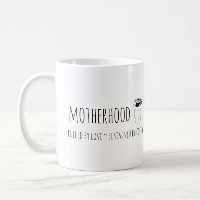 Motherhood fuelled by love, sustained by coffee mug (Left)