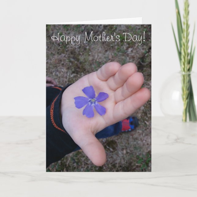 Mother's Day Child's Hand Giving Purple Flower Card (Front)