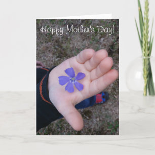 Mother's Day Child's Hand Giving Purple Flower Card
