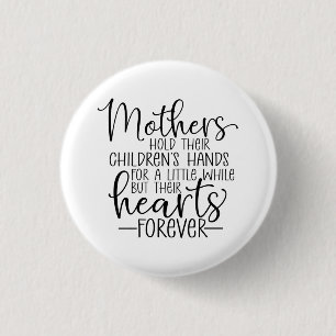Mothers hold their children’s hand for a little wh 3 cm round badge