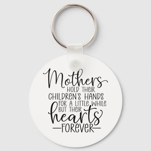 Mothers hold their children’s hand for a little wh key ring (Front)