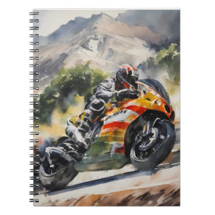 Motorbike cornering up a mountainside notebook
