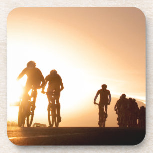 Mountain Bike Riders Make Their Way Over The Top Coaster