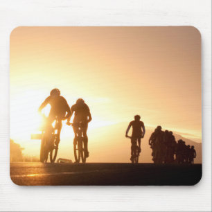Mountain Bike Riders Make Their Way Over The Top Mouse Mat