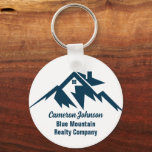 Mountain Real Estate Company Custom Marketing Key Ring<br><div class="desc">A cool mountain range real estate company keychain for a realty business located in a mountainous city or town. The realtor name is written in navy blue script under the house among mountains. Great marketing item for a mountaintop home builder.</div>