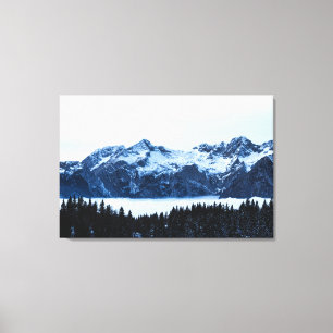 Mountains, spruce forest and clouds canvas print