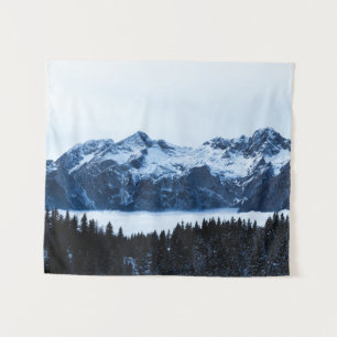 Mountains, spruce forest and clouds tapestry