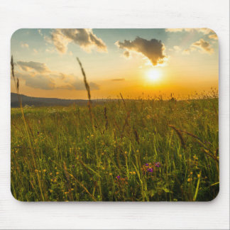 Mouse pad with sunset in mountains