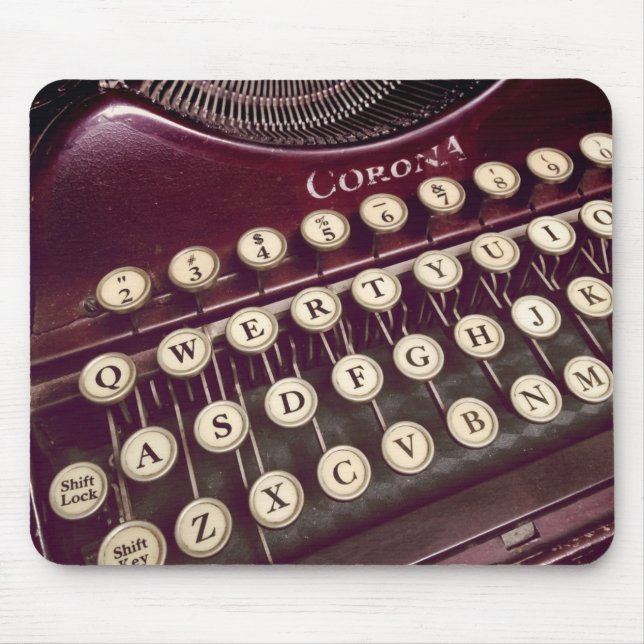 Mouse roams over a classic typewriter mat (Front)