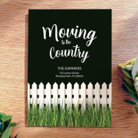 Moving to the country with white fence and grass