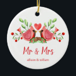 Mr and Mrs Cardinal Lovebirds Personalised Ceramic Tree Decoration<br><div class="desc">Decorate your tree with this "Mr and Mrs" design, featuring a pretty watercolor of two red cardinals. The lovebirds are face to face, perched on seasonal evergreens with a heart in between them. Underneath "Mr and Mrs" is written in fun modern typography and you can personalise with the couple's first...</div>