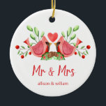 Mr and Mrs Cardinal Lovebirds Personalised Ceramic Tree Decoration<br><div class="desc">Decorate your tree with this "Mr and Mrs" design, featuring a pretty watercolor of two red cardinals. The lovebirds are face to face, perched on seasonal evergreens with a heart in between them. Underneath "Mr and Mrs" is written in fun modern typography and you can personalise with the couple's first...</div>