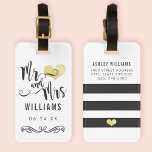 Mr. and Mrs. Monogram Black Gold Wedding Newlywed Luggage Tag<br><div class="desc">Stylish travel luggage bags for the new Mr. and Mrs. feature a stylish script design with heart and scroll accents,  bold black and white stripes,  and custom text on the front and back sides. Personalise with your married name and personal contact information.</div>