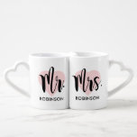 Mr and Mrs Pink Heart Custom Wedding Monogram Coffee Mug Set<br><div class="desc">Personalised monogram coffee mugs make a unique wedding gift for the new Mr and Mrs! This minimalist design features modern black script writing,  a pink heart background,  and custom text that can be personalised with the newlywed couple's married last name.</div>