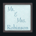 Mr. and Mrs. Snowflakes Gift Box<br><div class="desc">A lovely gift box for a couple,  this design features a blue snowflake background with "Mr. and Mrs." written in lovely typography.  Use the template to personalise your name.

Blue Christmas background:  Sonya DeHart Design 
http://www.sonyadehartdesign.com |
http://www.sonyadehartdesign.etsy.com</div>