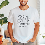 Mr Black Modern Script Custom Wedding T-Shirt<br><div class="desc">Modern and casual chic black calligraphy script "Mr." men's wedding tee shirt features custom text that can be personalised with the groom's last name and wedding date / date established. Perfect for the newly wed to wear at the honeymoon and beyond! Visit our store for the matching Mrs. shirt.</div>