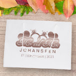 Mr & Mrs Elegant Classic Rose Gold foil Newlyweds Large Gift Bag<br><div class="desc">Elevate your wedding gift with our 'Mr & Mrs' Rose Gold Foil Gift Bag! Personalise it with the new Mr. and Mrs. family name and wedding date, adding a special touch to your present. Adorned with elegant hearts and a rose gold foil engagement ring design, this bag is the perfect...</div>