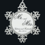 Mr. & Mrs. Newlywed Snowflake Pewter Christmas Ornament<br><div class="desc">Did you get married this year? Add a memory to your tree with this wedding keepsake ornament with the words, "Mr. and Mrs." along with your names and wedding date in a beautiful black calligraphy on white. This elegant ornament also makes a gift for a newlywed couple for their first...</div>