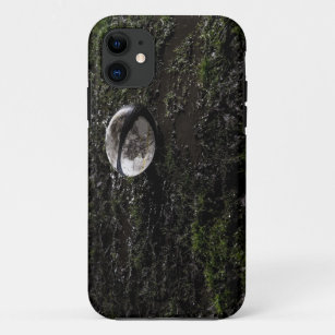 Muddy rugby ball sitting on a chewed up grass Case-Mate iPhone case