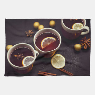 Mugs of mulled wine, hot winter drink tea towel