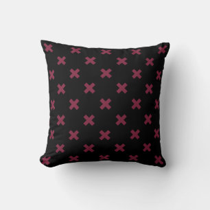 Mulberry cross stitches on black cushion